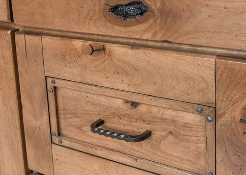 Natural wood toned cabinetry in bathroom