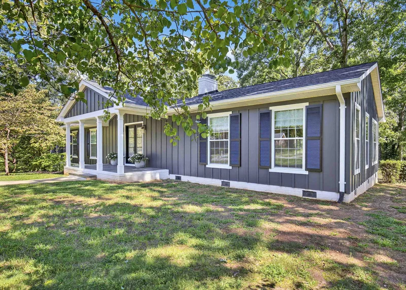 home addition with added square footage and new siding
