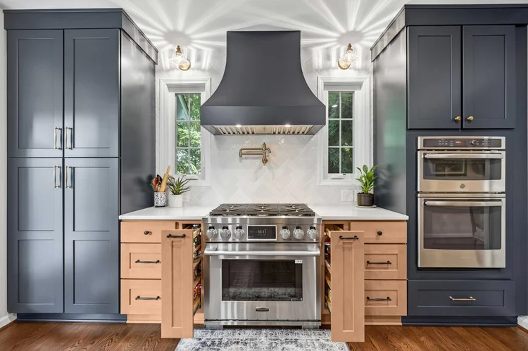 Easley kitchen remodel range wall with open spice drawers displaying built-in cabinetry
