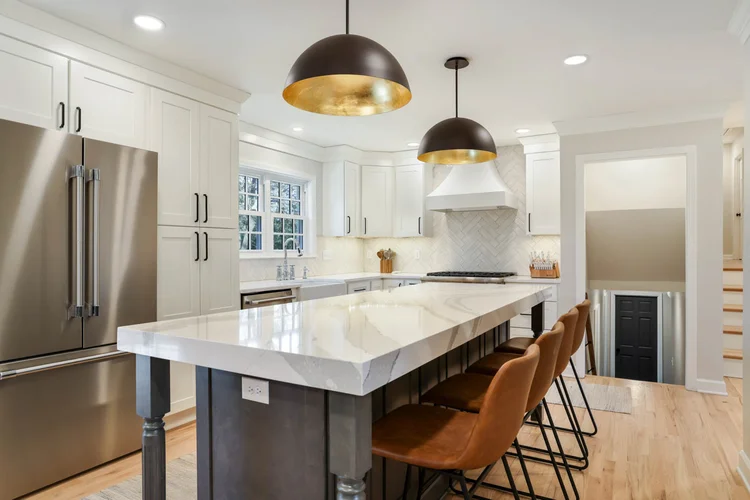 Luxury kitchen remodel in greenville sc featuring 3 inch quartz countertops